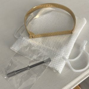 Women’s gold tone bracelet by Sahira